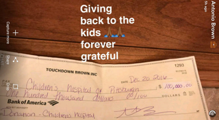 Antonio Brown shows off his hefty donation to Children’s Hospital of Pittsburgh.Snapchat